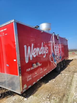 Red Wendy's food truck with branding, marked "For Delivery Only." Features logos of Uber Eats, DoorDash, Postmates, Grubhub.