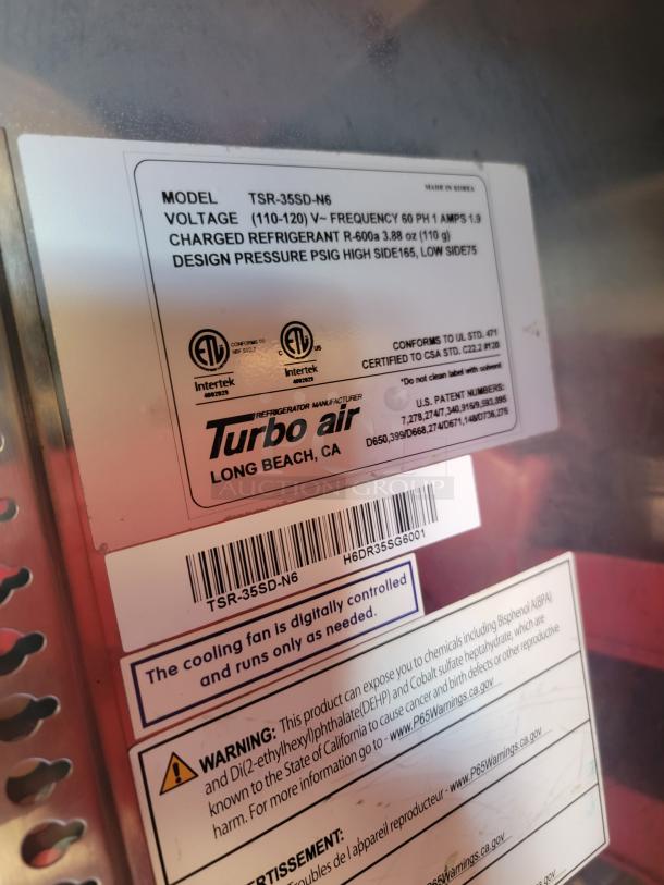 Turbo Air TSR-35SD-N6 refrigerator label. Voltage: 110-120V, Refrigerant: R-600a. Warning for chemical exposure.