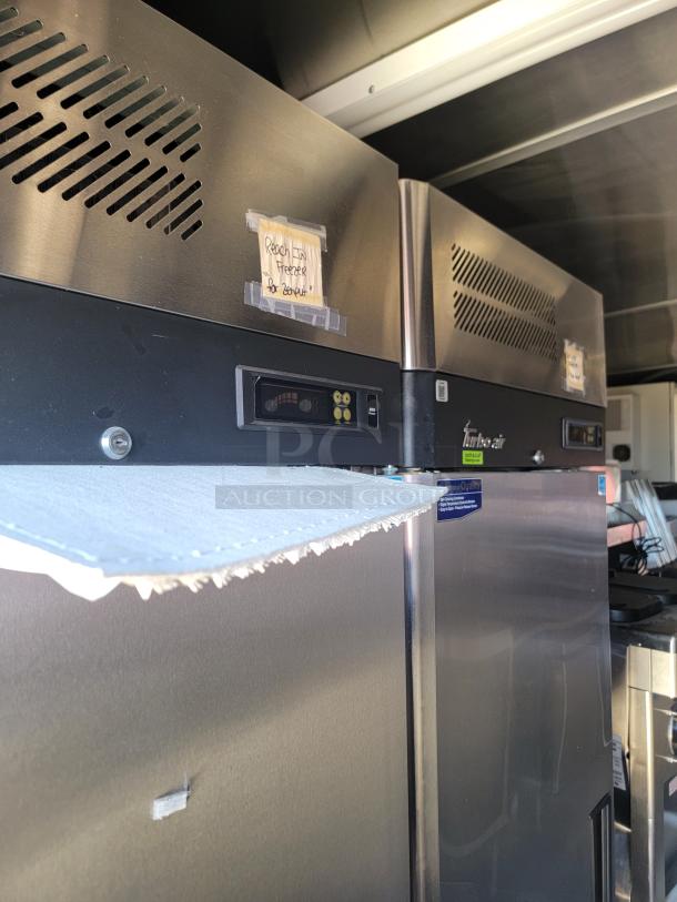 Stainless steel Turbo Air freezer in excellent condition with digital display and interior labels for yogurt storage.