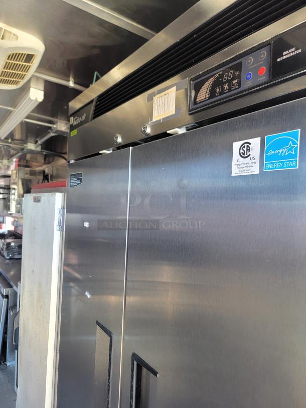 Stainless steel EnviroAir deluxe refrigerator, digital display, Energy Star certified, excellent condition.