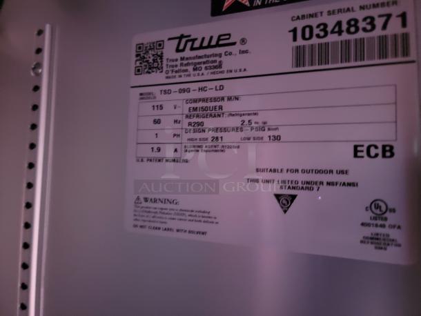 True refrigerator label showing model TSD-09G-HC-LD. Serial number 10348371. Voltage 115V, refrigerant R290, suitable for outdoor use.