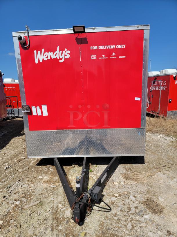 Red Wendy's delivery trailer, featuring Uber Eats, DoorDash logos, "For Delivery Only" text, chain lock on hitch, excellent condition.