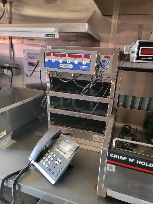 Prince Castle commercial food warmer with digital control panel, three slots, minor wear. Includes Verizon office phone.