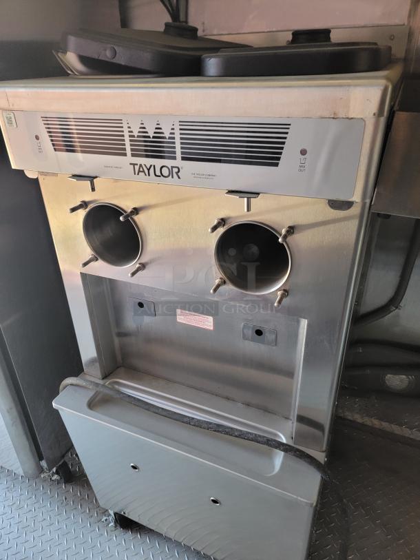 Taylor commercial ice cream machine, stainless steel, dual dispense, model C723, in good condition.