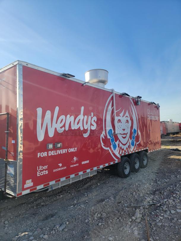 Red Wendy's food delivery trailer with tri-axle; branded logos include Uber Eats, DoorDash, Postmates, and Grubhub.