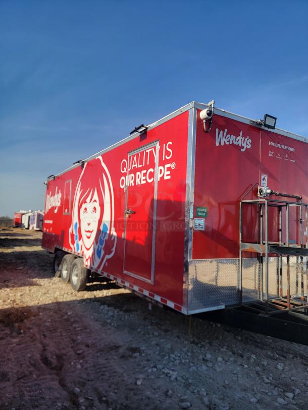 Red Wendy's food trailer with logo, "Quality is Our Recipe" text. Equipped for delivery, good condition, portable water label.