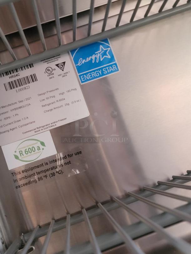 Stainless steel appliance with Energy Star label and specifications tag. Uses R-600a refrigerant. Manufactured Sep 2021.