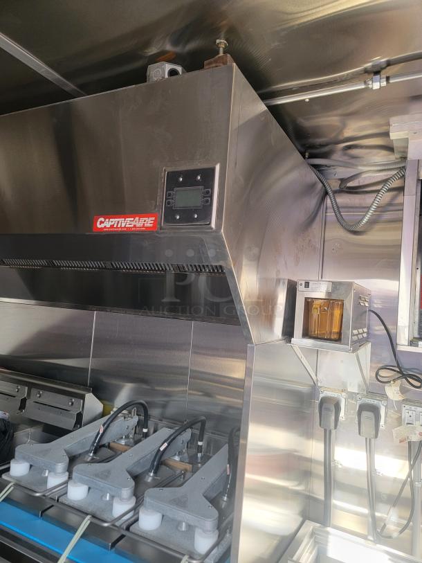 CaptiveAire stainless steel commercial kitchen hood with digital control panel, in excellent condition.