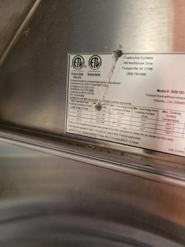 CaptiveAire Systems exhaust hood label showing model 3650 BD, certification info, and installation guidelines.