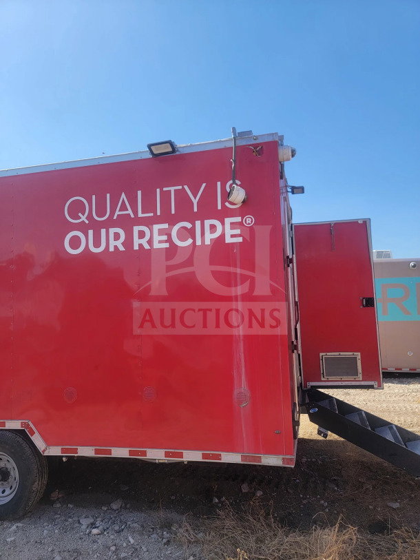 2021 Rock Solid Cargo 8.5' x 28' mobile kitchen trailer, red exterior, triple-axle, for sale. Features include a CaptiveAire hood and full kitchen suite.