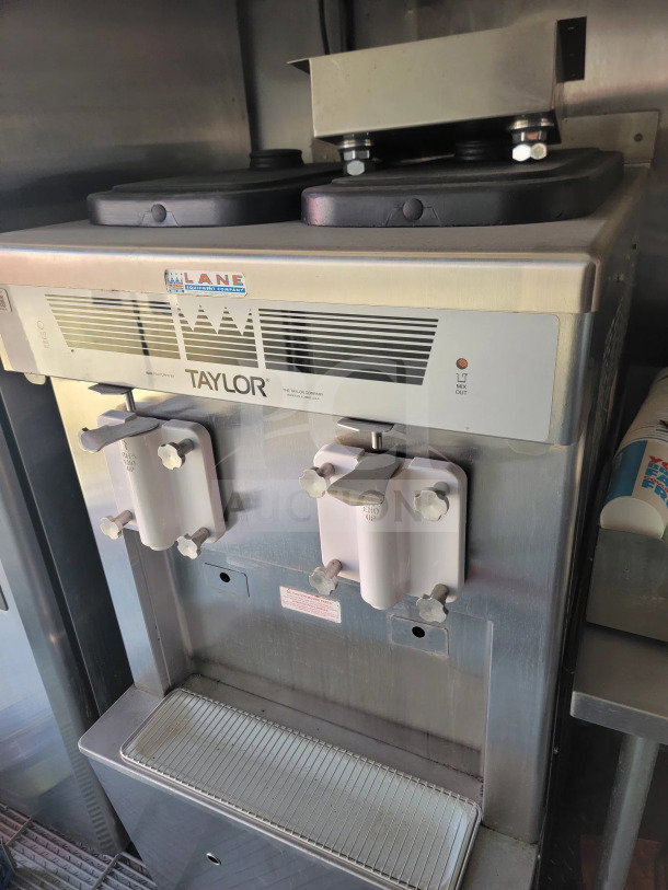 Taylor ice cream machine in good condition inside a 2021 Rock Solid Cargo mobile kitchen trailer. Features Lane Equipment sticker.