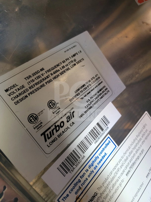 Label on metal surface for Turbo Air refrigerator model TSR-35SD-N6, 110-120V, 1.9 amps, made in Korea.