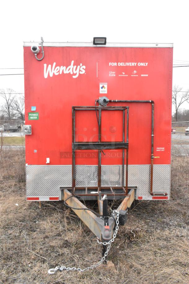 Brand new Wendy's mobile kitchen trailer, 8.5' x 28', featuring Henny Penny fryer, Taylor ice cream machine, Garland grill, refrigeration units, and more. Triple axle, 3-phase electric, full plumbing, with clear title.