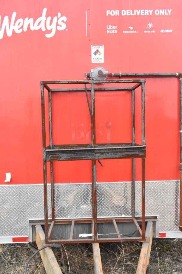 Brand new 8.5'x28' Wendy's mobile kitchen trailer with Henny Penny fryer, Taylor ice cream, Garland grill, and more.