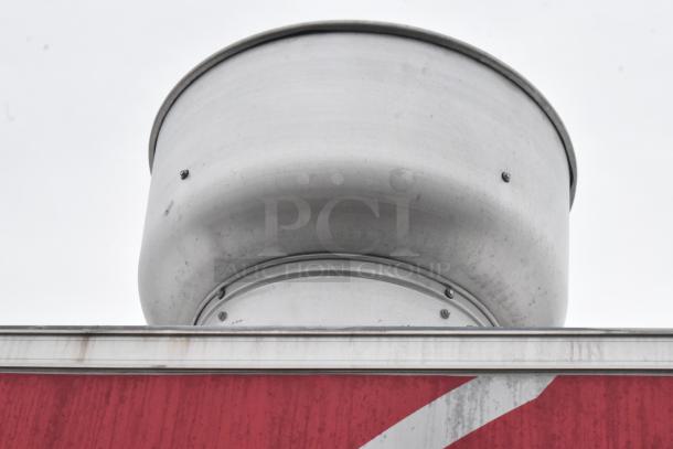 Exterior top view of a Wendy's mobile kitchen trailer, showcasing a metal ventilation detail.