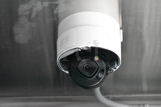 CCTV camera installed on the ceiling inside a kitchen trailer.