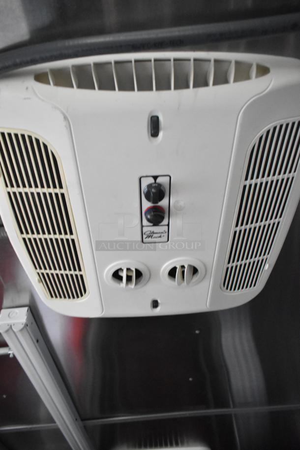 Coleman Mach A/C unit controls in a Wendy's mobile kitchen trailer. New, fully equipped with refrigeration and cooking appliances.