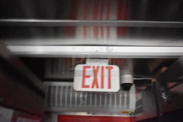 Interior of Wendy's Mobile Kitchen with visible exit sign.
