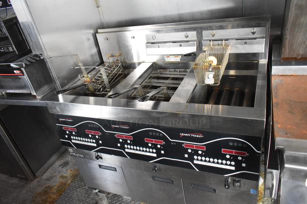 Brand new Henny Penny Evolution Elite 3-Bay Gas Fryer in Wendy's mobile kitchen trailer, fully equipped, unused.