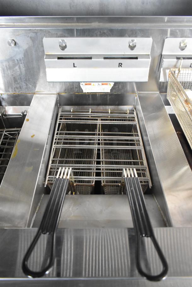 Henny Penny Evolution Elite 3-Bay Gas Fryer in pristine condition, shown with fry baskets and control panel labels "L" and "R."