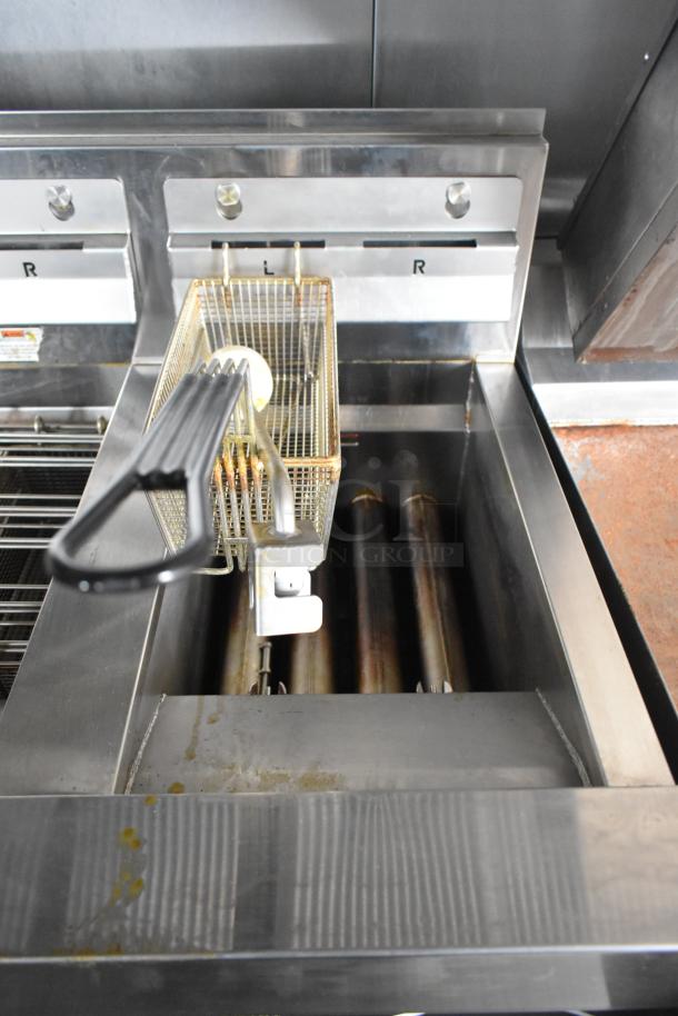 Henny Penny Evolution Elite 3-Bay Gas Fryer in new condition, stainless steel with fry basket, from Wendy's Mobile Kitchen Trailer.