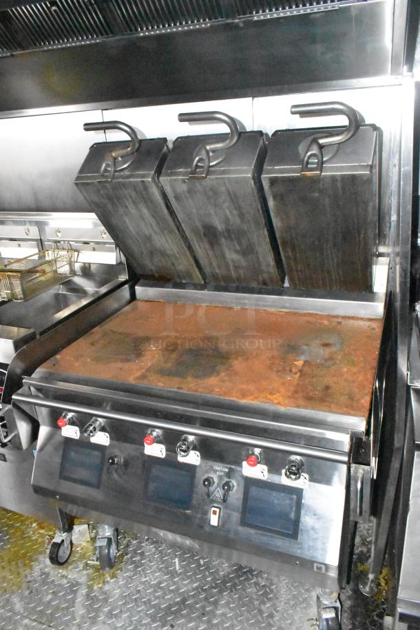 Wendy's mobile kitchen trailer with Garland Clamshell Grill, fully equipped and brand new, features tested and functional equipment.