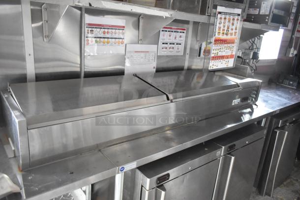 Brand new 8.5' x 28' mobile kitchen trailer interior, featuring stainless steel appliances and food prep area.