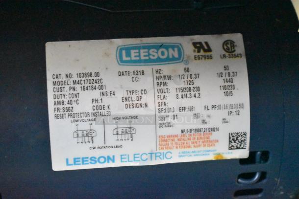 Label showing Leeson Electric motor details: Model M4C17DZ42C, 1/2 HP, 1725 RPM, 115/208-230V, 60Hz, continuous duty.