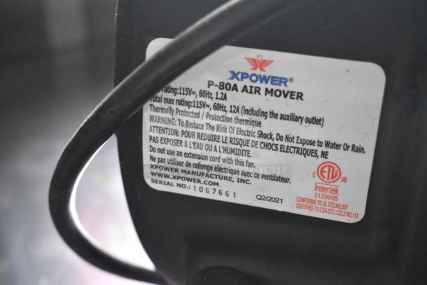 XPOWER P-80A Air Mover, 115V/60Hz, 12A, thermally protected, warning label on reducing electric shock risk.