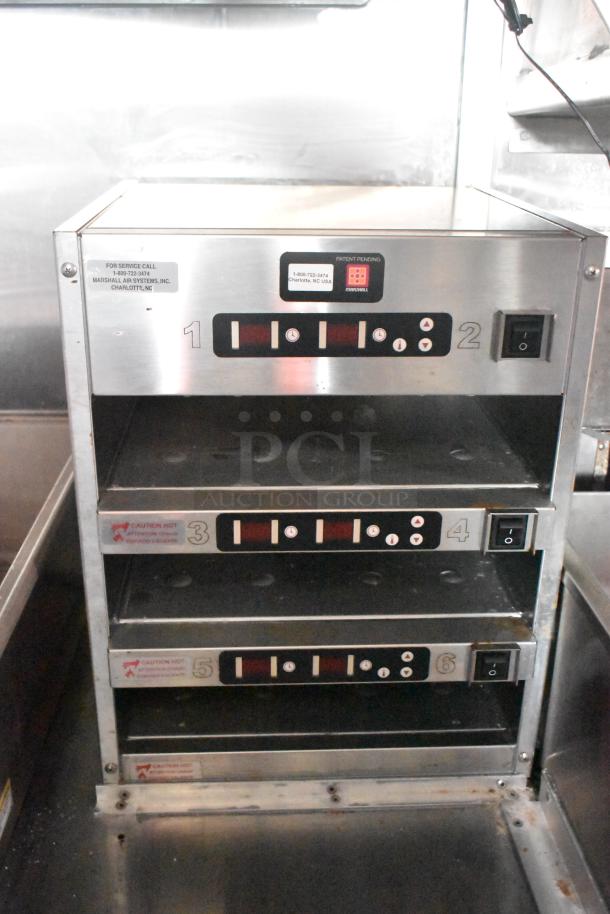 Marshall Air Systems, 6-slot warming rack in new condition with control panel, model numbers, and service labels visible.