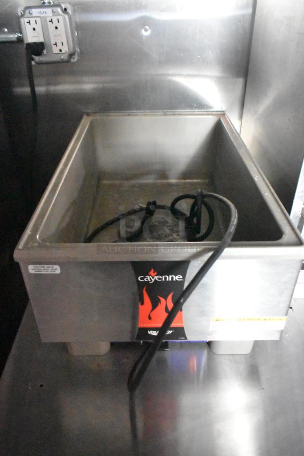 Cayenne electric food warmer in new condition with visible power cord, metal construction, and caution labels displayed.