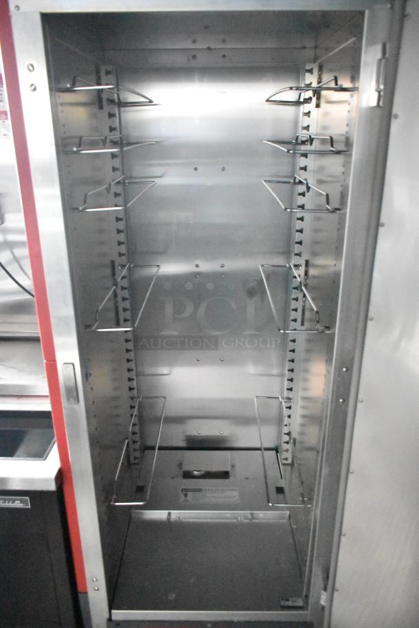 Metro C5 holding cabinet interior view, stainless steel, adjustable racks, new condition, part of Wendy's mobile kitchen.