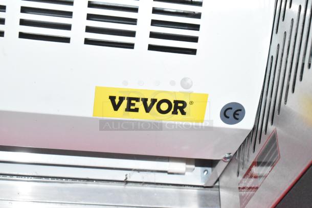 Label on kitchen equipment featuring "VEVOR" with a CE mark, indicating compliance with European standards.