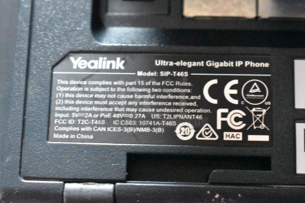 Yealink Ultra-elegant Gigabit IP Phone, Model SIP-T46S label showing compliance with FCC rules and input specifications.