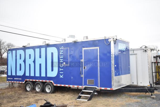 2021 Rock Solid Cargo 28' fast food trailer, fully equipped for kitchen, blue with "NBRHD KITCHENS" branding, clear title.