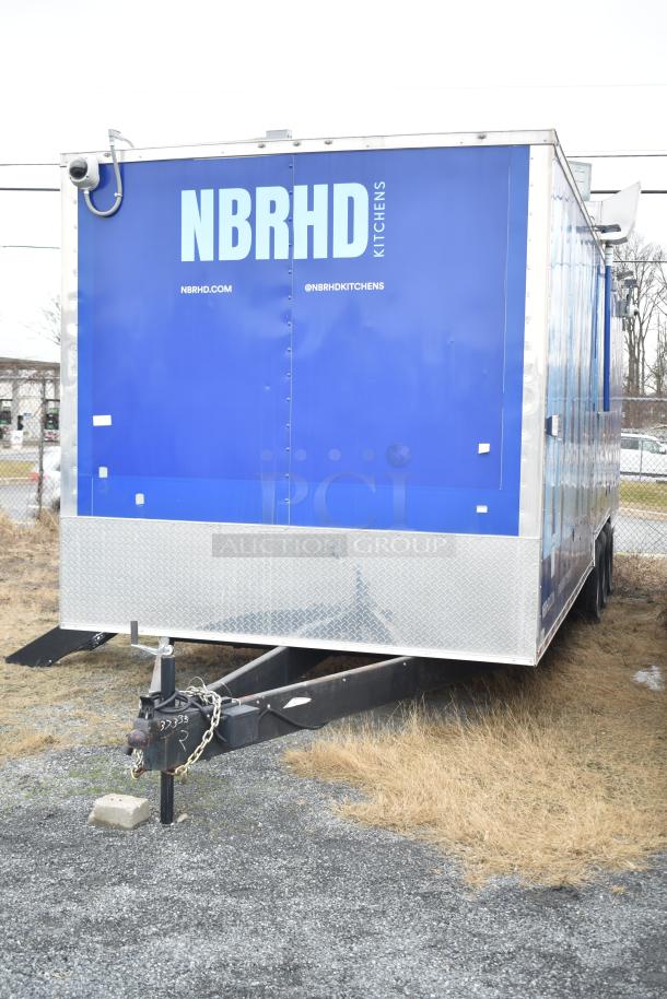 2021 Rock Solid Cargo 28' mobile kitchen trailer, blue exterior, for fast food service. Includes commercial-grade equipment.