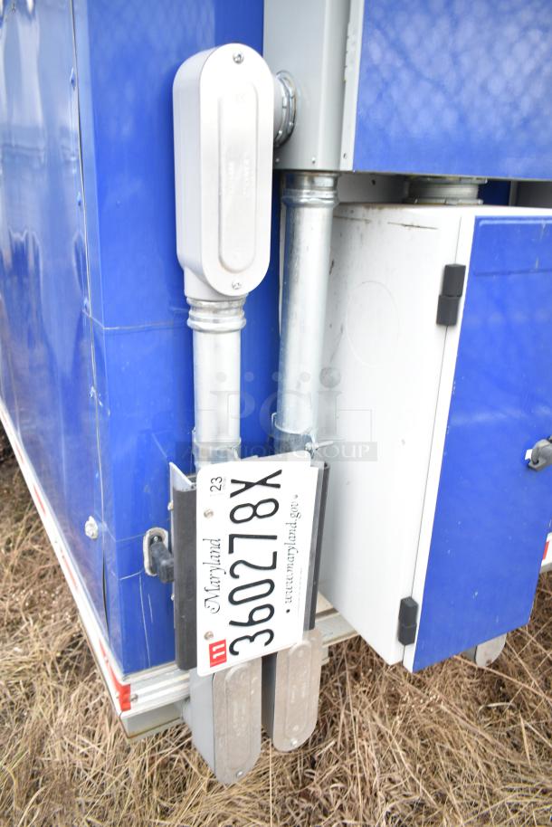 2021 Rock Solid Cargo 28' fast food trailer with Maryland license plate, blue exterior, and electrical fixtures.