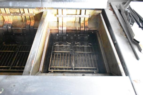 Nieco broiler inside 2021 Rock Solid Cargo fast food trailer. Features commercial-grade grills, showing signs of use.