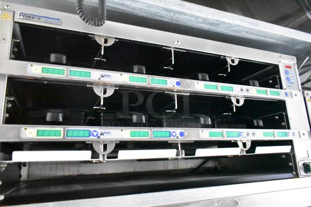 Commercial kitchen setup in a 2021 Rock Solid Cargo trailer featuring Prince Castle holding bins, ideal for fast food operations.