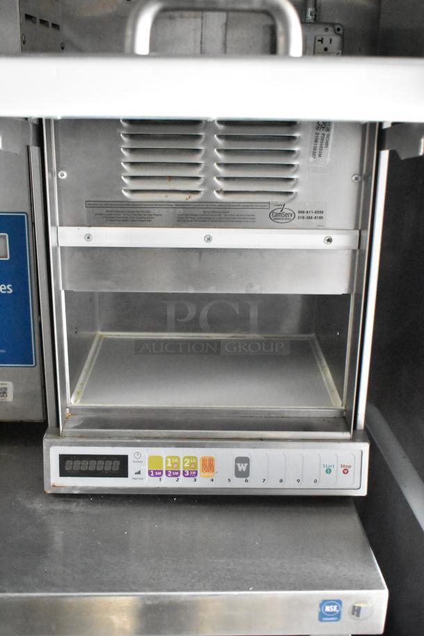 Comserv stainless steel commercial warming drawer in mobile kitchen. Features control panel and NSF certification.