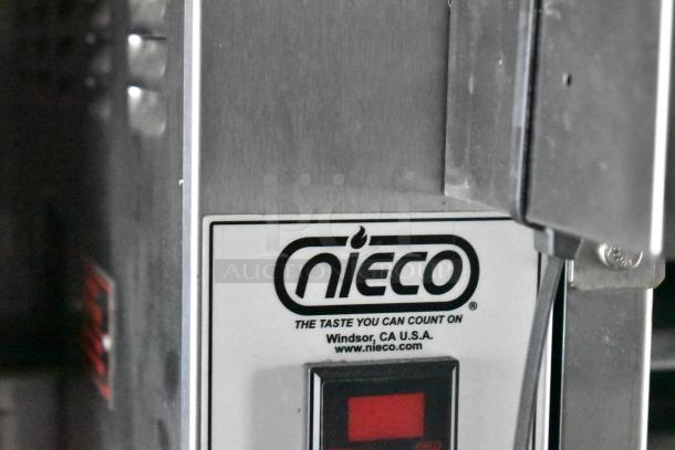 Nieco broiler control panel with branding and contact information, part of a 2021 Rock Solid Cargo mobile kitchen.