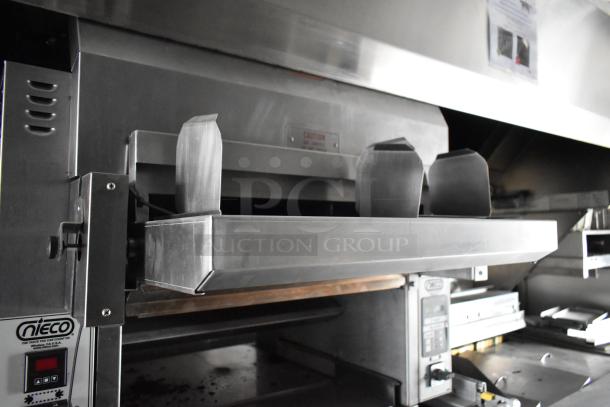 2021 Rock Solid Cargo 28' fast food trailer with Nieco broiler, CaptiveAire hood, and multiple commercial appliances.