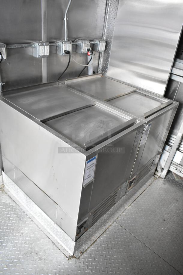2021 Rock Solid Cargo 28' fast food trailer interior. Stainless steel setup with commercial-grade equipment.