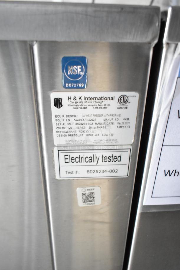 Sticker with H & K International label on stainless steel, showing equipment details and certifications. NSF certified, electrically tested.