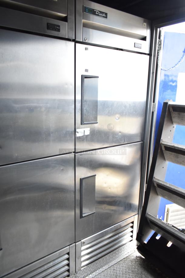 True commercial cooler and freezer in 2021 Rock Solid Cargo fast food trailer. Stainless steel finish, left door open, clear title.