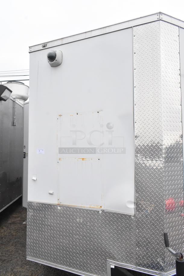 2020 ATX 8.5' x 24' food trailer with CaptiveAire hood, Arctic Air equipment, single axle, visible wear, sold with clear title.