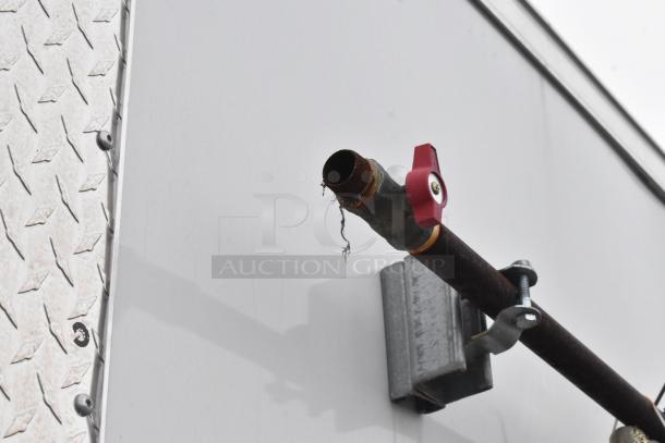 Exterior detail of 2020 ATX 8.5' x 24' trailer with pipe and valve, showcasing construction quality.