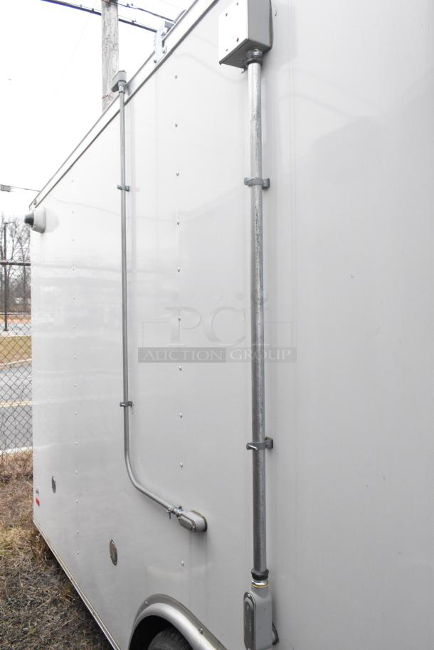 2020 ATX 8.5' x 24' cold food trailer with CaptiveAire grease hood. Equipped with Arctic Air prep tables and coolers. Single axle.