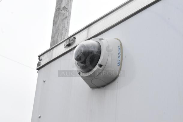 Exterior view of a 2020 ATX food trailer featuring a security camera on the upper side.