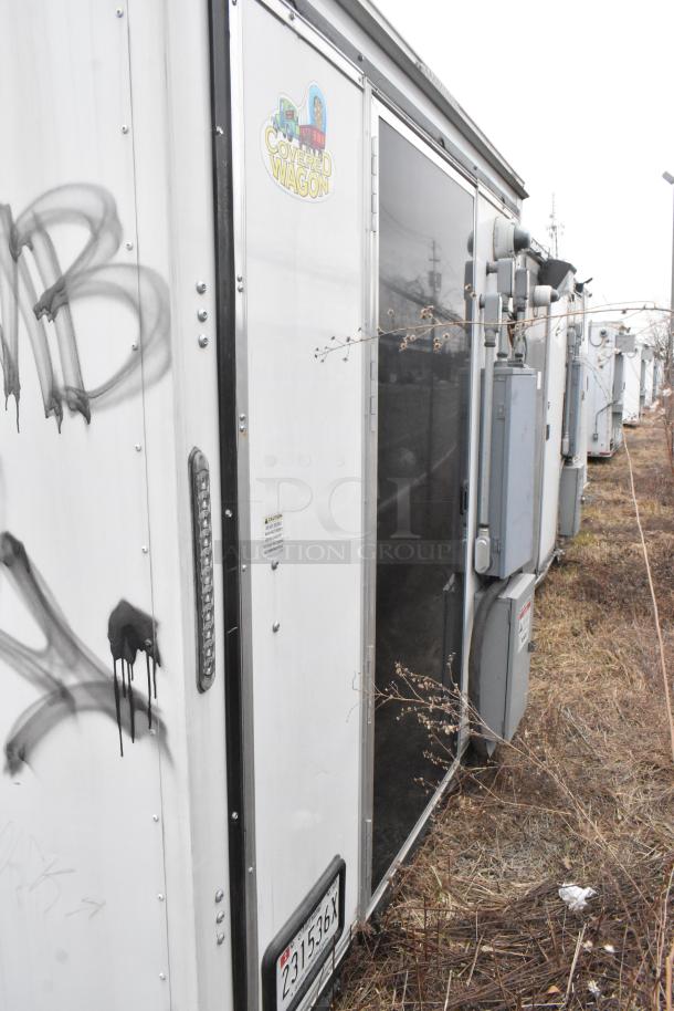 2020 ATX 8.5' x 24' cold food trailer with grease hood, fire suppression, Arctic Air units, and network cabinet. Single axle.